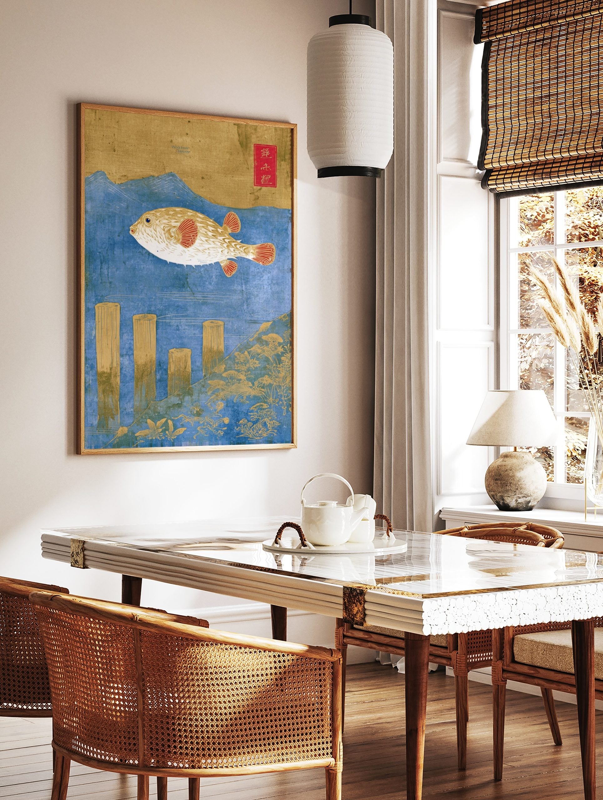 Ukiyo-e style pufferfish art print with gold fish, red fins, blue water, wooden posts, and Japanese, in a styled room mockup