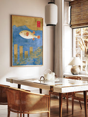 Ukiyo-e style pufferfish art print with gold fish, red fins, blue water, wooden posts, and Japanese, in a styled room mockup