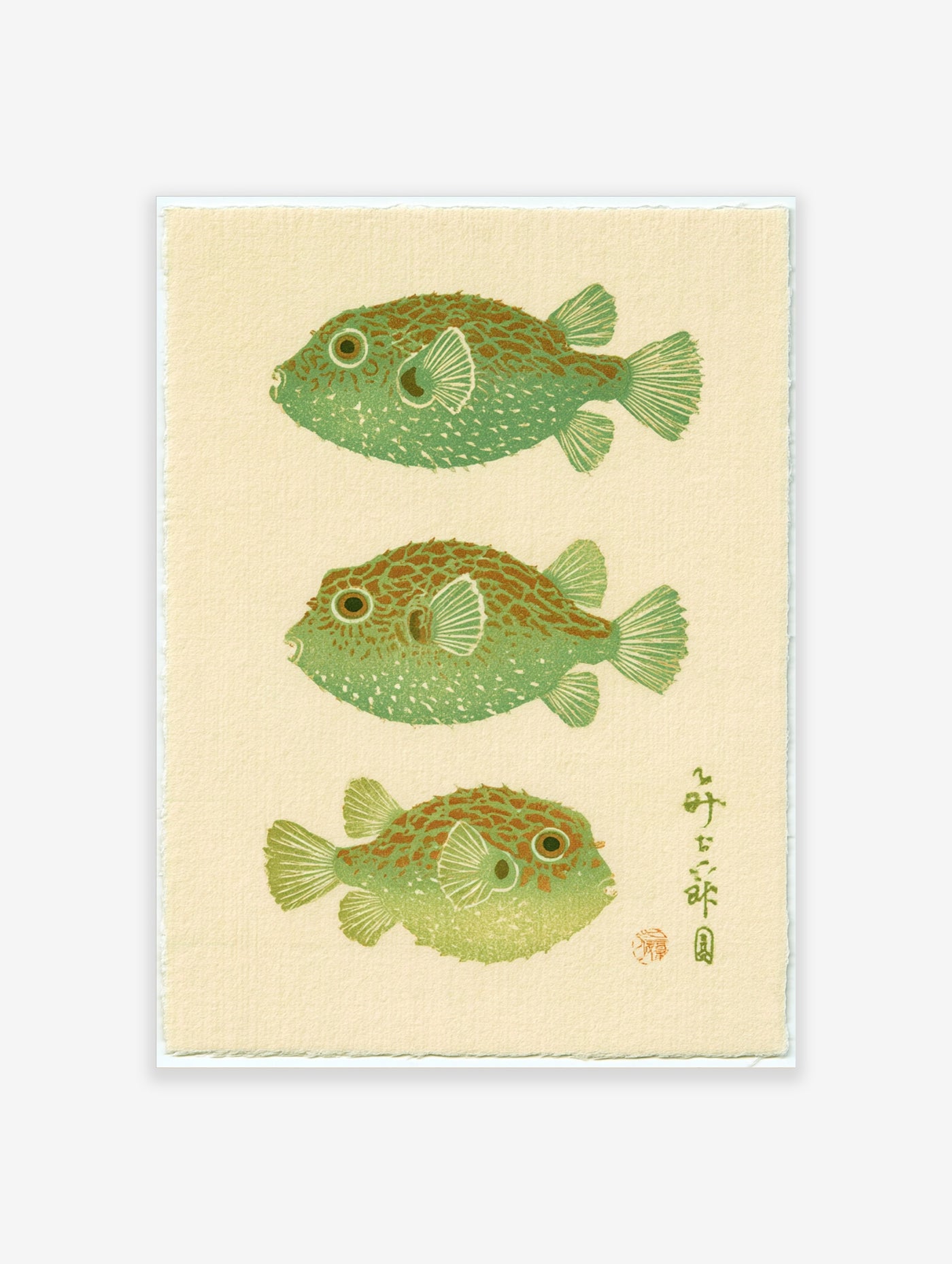 Japanese woodblock style illustration of three green pufferfish with calligraphy on textured cream paper