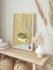 Japanese-inspired pufferfish wall art print with patterned fish and yellow fins amidst reeds, in an alternate framed mockup