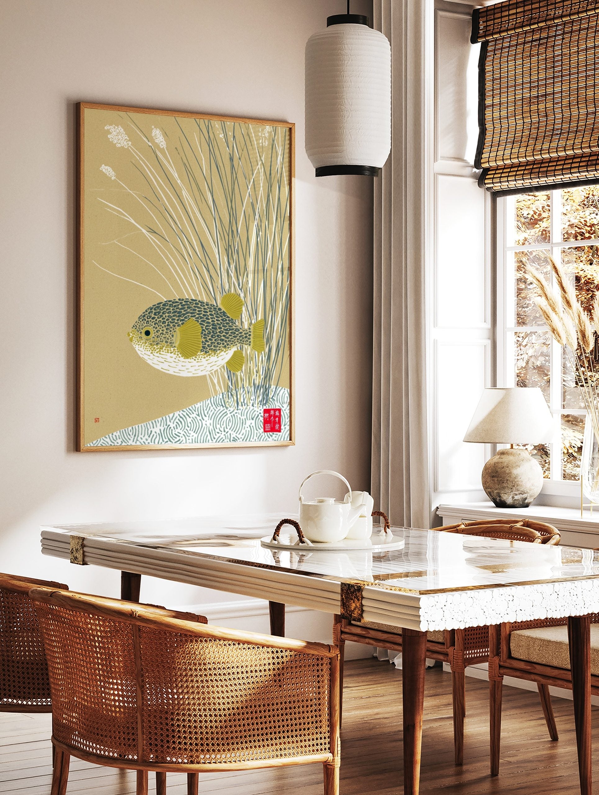 Japanese-inspired pufferfish wall art print with patterned fish and yellow fins amidst reeds on a, in a styled room mockup