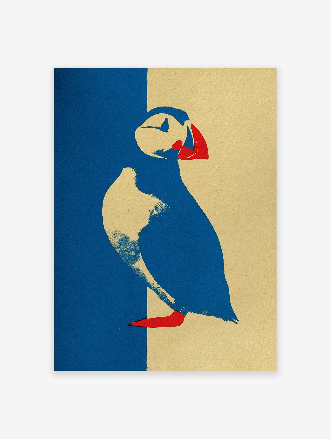 Graphic puffin wall art illustration in blue, yellow, and red on textured paper.
