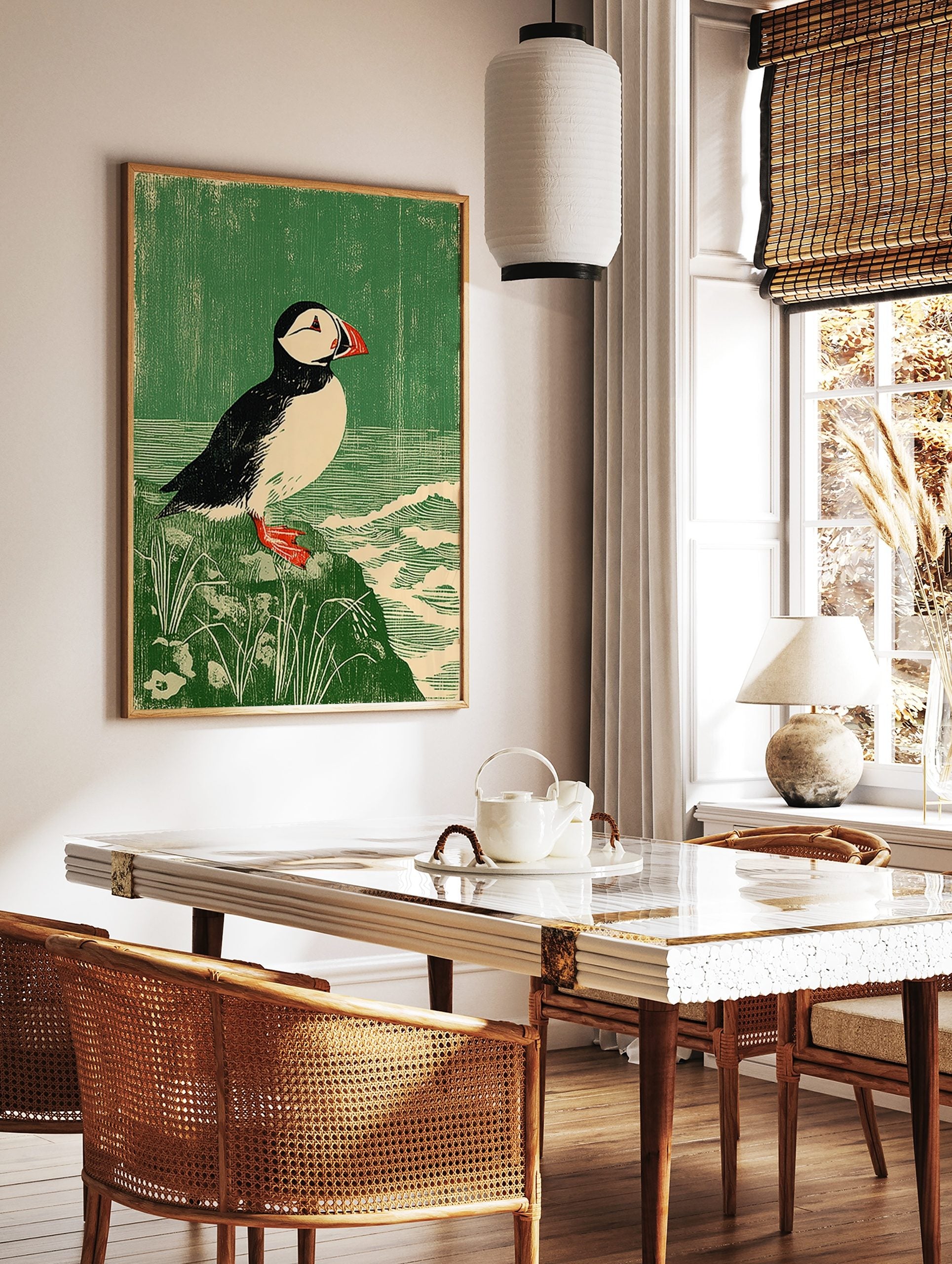 Atlantic Puffin bird print in linocut style on a rock with green background and waves, in a styled room mockup