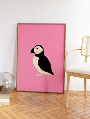 Minimalist black and white puffin bird illustration on a textured pink background art print - Image 2