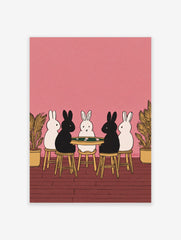 Illustrative print of five black and white rabbits playing cards at a green table on a pink background