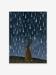 Illustrative rabbit silhouette gazing up at falling golden stars against a textured deep blue night sky art print