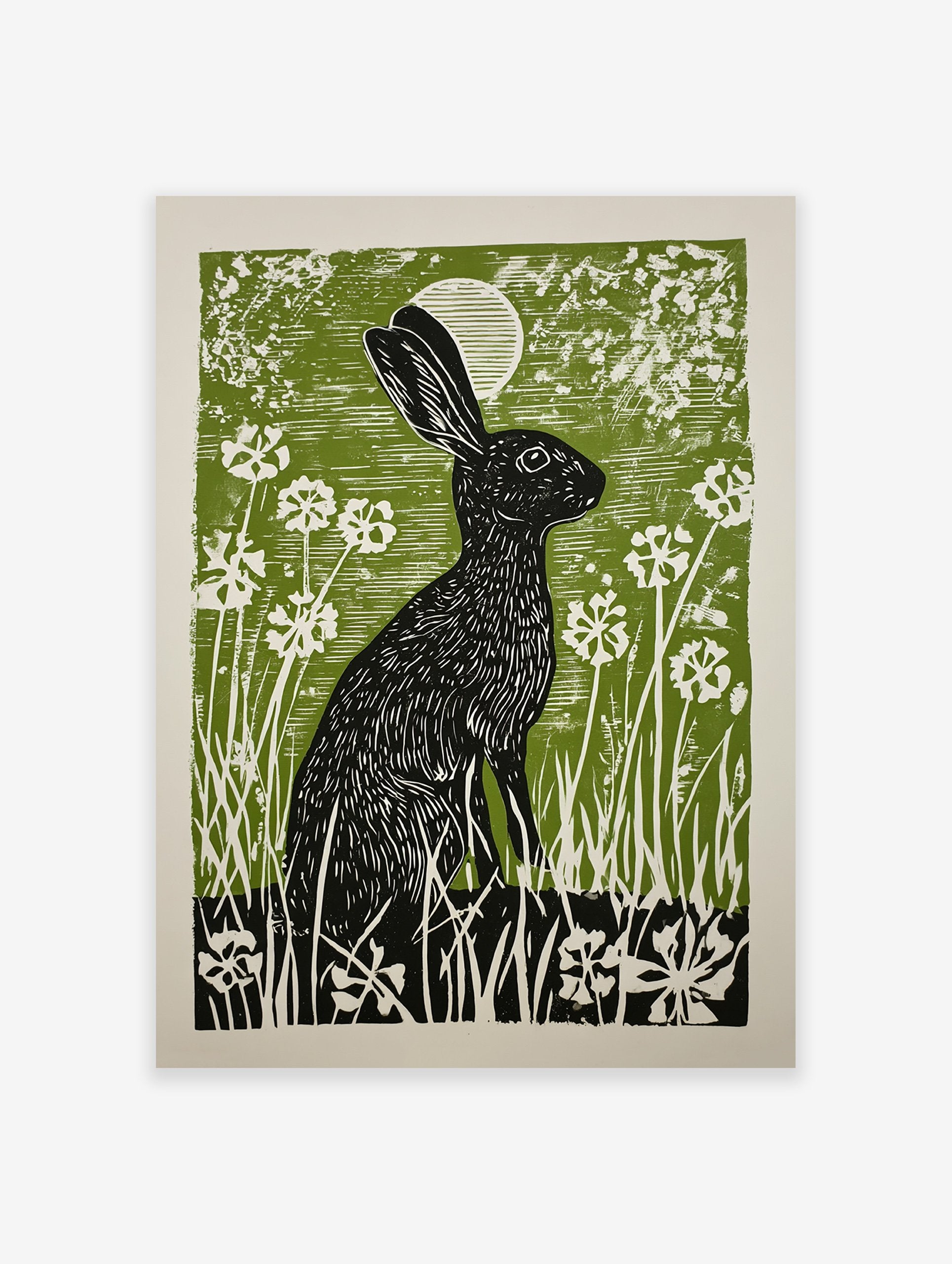 Black rabbit linocut print in a green field with white flowers and a moon, illustrative wall art.
