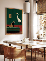 Illustrative art print of a raccoon on a green couch and a crane in a green and red room, in a styled room mockup