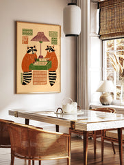 Illustrative print of two raccoons playing a board game under a lamp, with patterned wall decor, in a styled room mockup