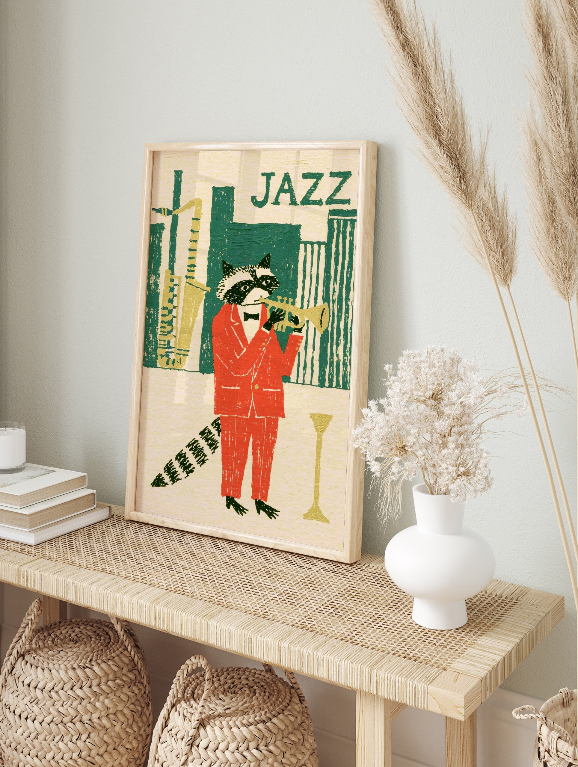 Illustration of a raccoon in a red suit playing a trumpet against a green city skyline with, in an alternate framed mockup