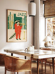 Illustration of a raccoon in a red suit playing a trumpet against a green city skyline with the, in a styled room mockup