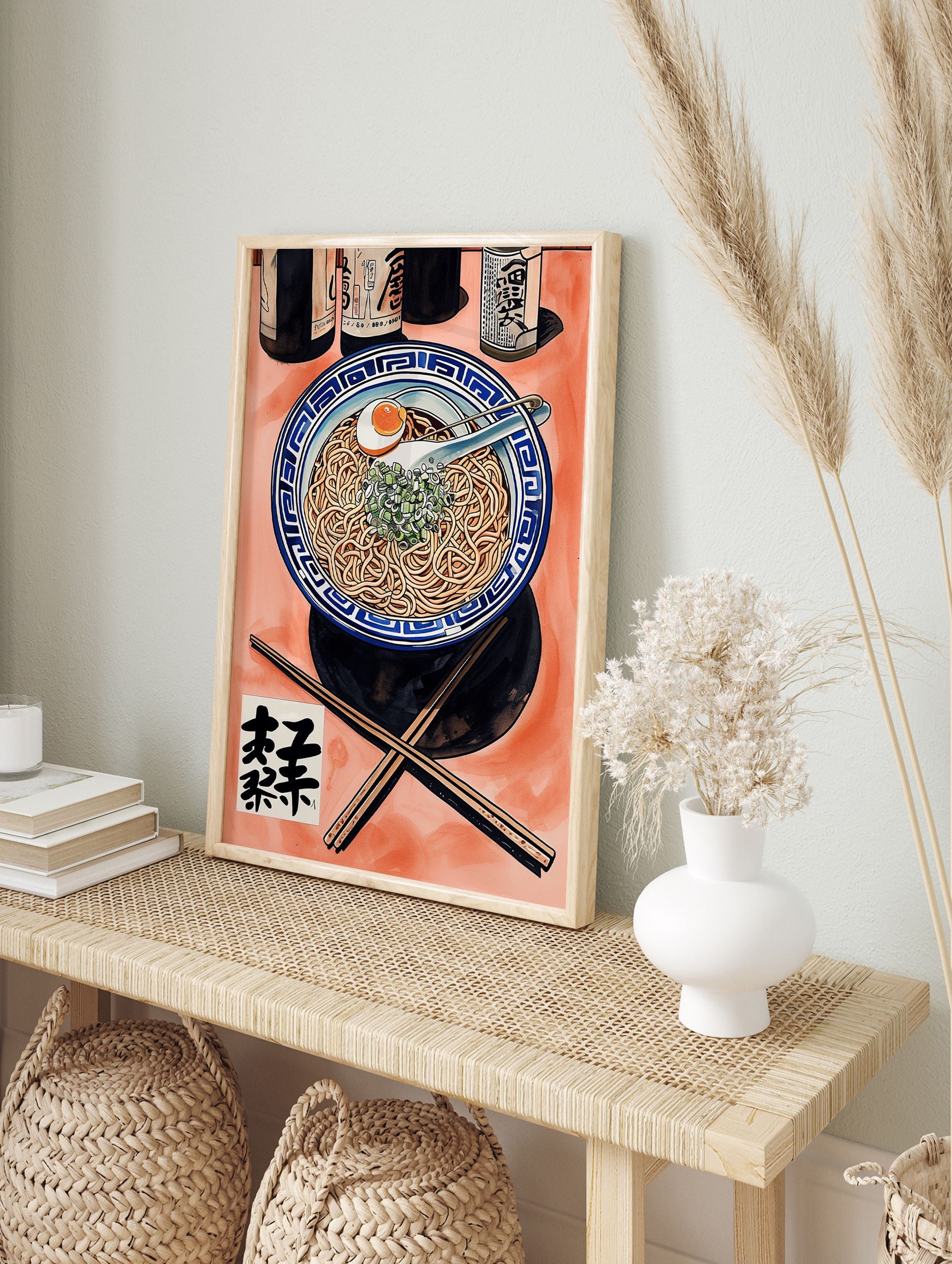 Ramen bowl poster with noodles, egg, and green onions, accompanied by bottles and chopsticks on an orange background. - Image 4
