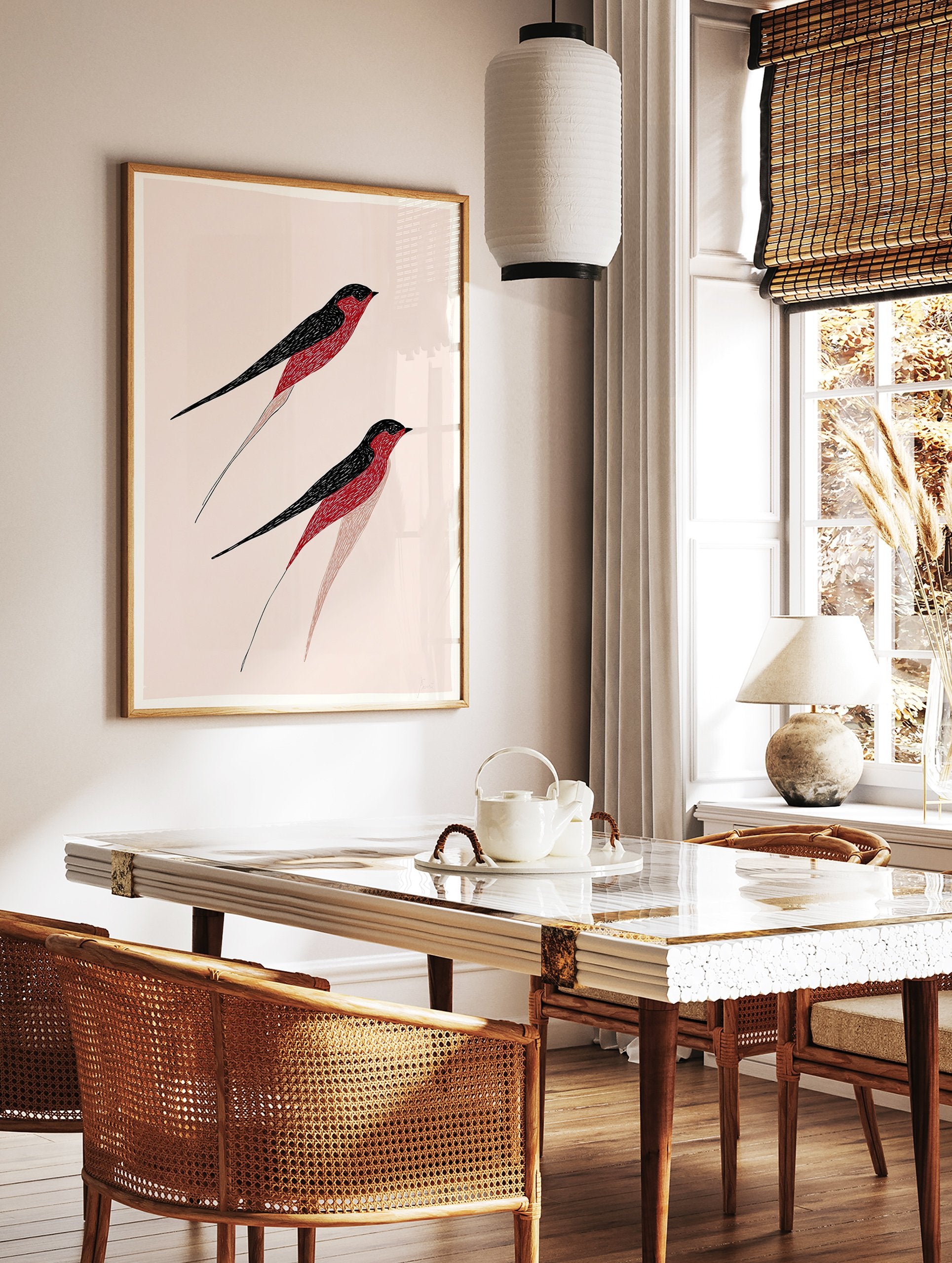 Stylized red and black bird wall art print featuring two flying swallow-like birds on a light pink background. - Image 2