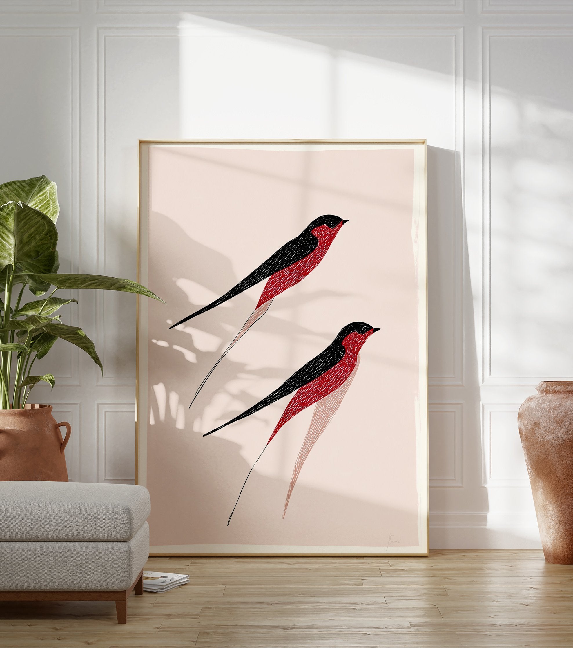Stylized red and black bird wall art print featuring two flying swallow-like birds on a light pink background. - Image 3