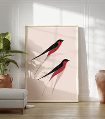 Stylized red and black bird wall art print featuring two flying swallow-like birds on a light pink background. - Image 3