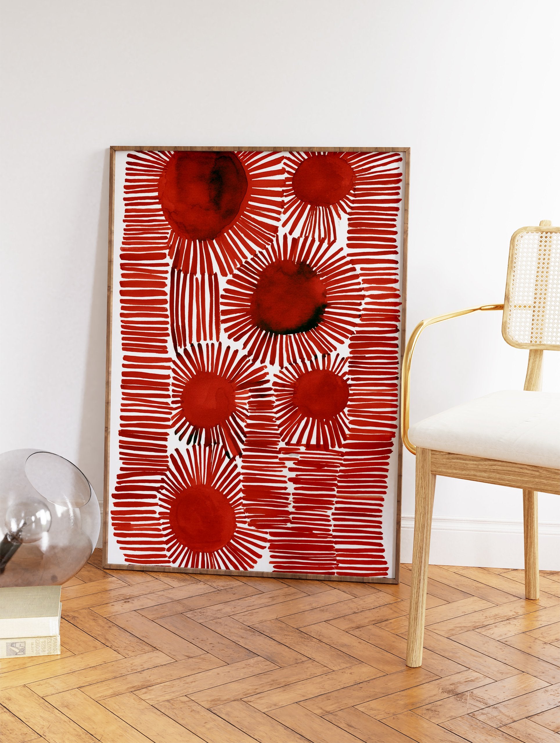 Red abstract wall art print with multiple stylized sunburst shapes and horizontal line patterns on a white background. - Image 2