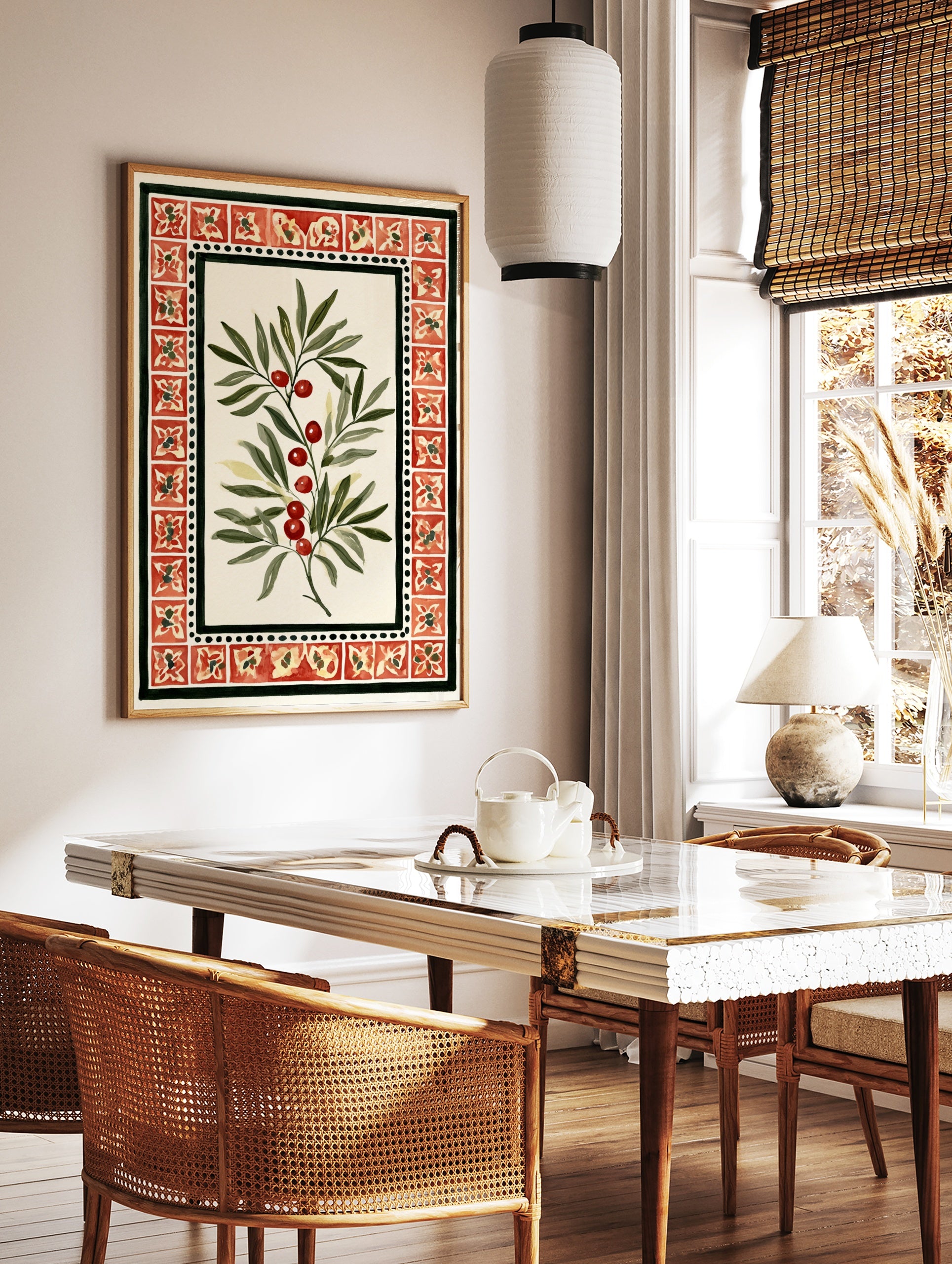 Botanical illustration of a branch with red berries and green leaves within a red tile border on, in a styled room mockup