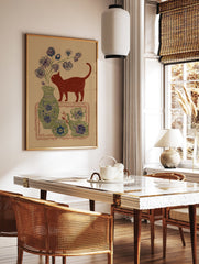 Red cat illustration with botanical blue flowers in a green vase and decorative pottery on a brown background, folk art style. - Image 2