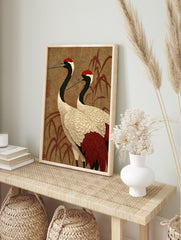 Japanese Red-Crowned Crane art print with two cranes and bamboo on a textured brown background, in an alternate framed mockup
