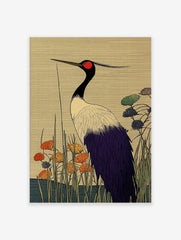 Japanese art print of a red-crowned crane with black neck, red crown, white and purple feathers, standing among reeds and