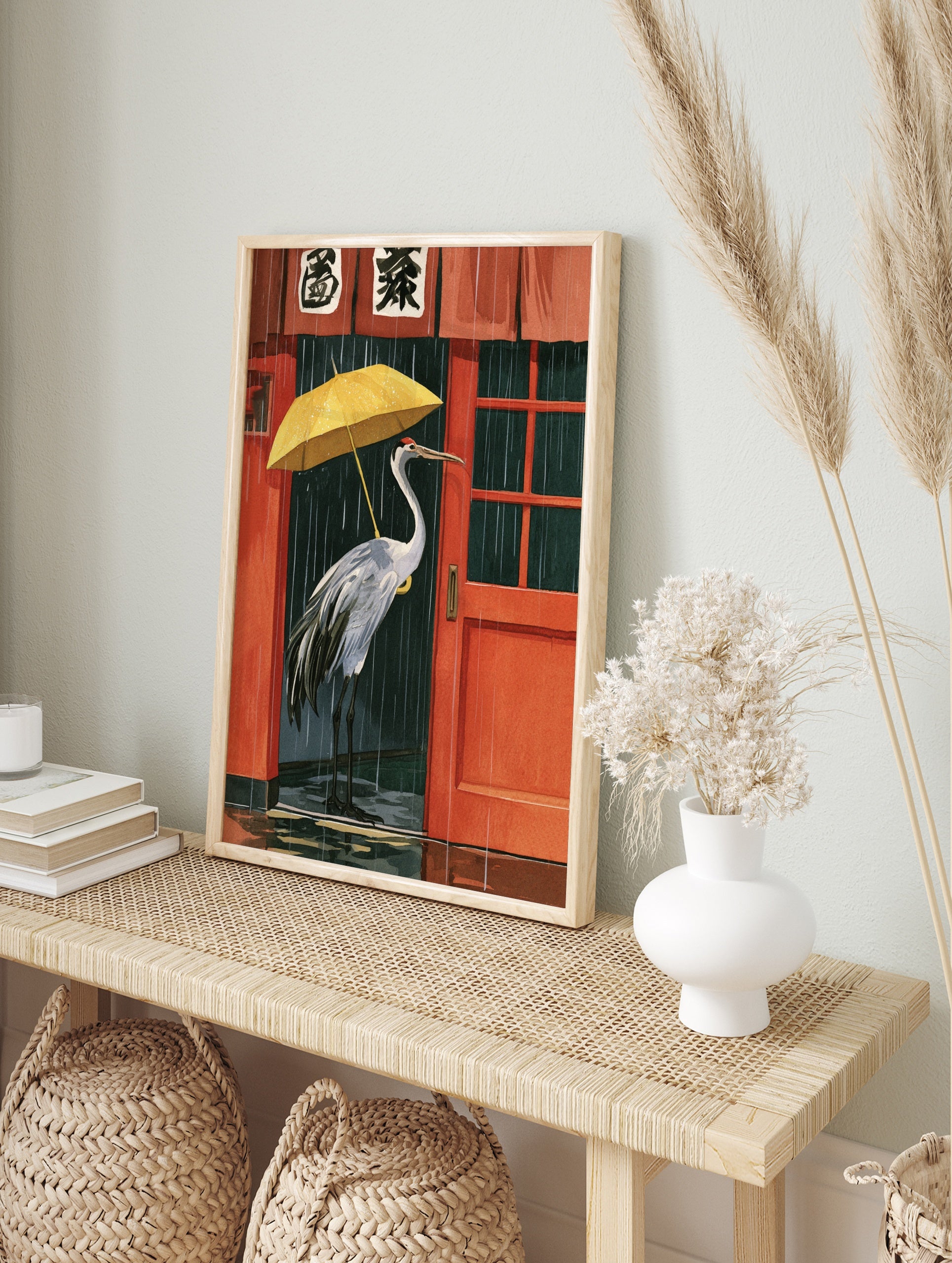 Red-crowned crane holding a yellow umbrella in rain outside a red Japanese building, in an alternate framed mockup