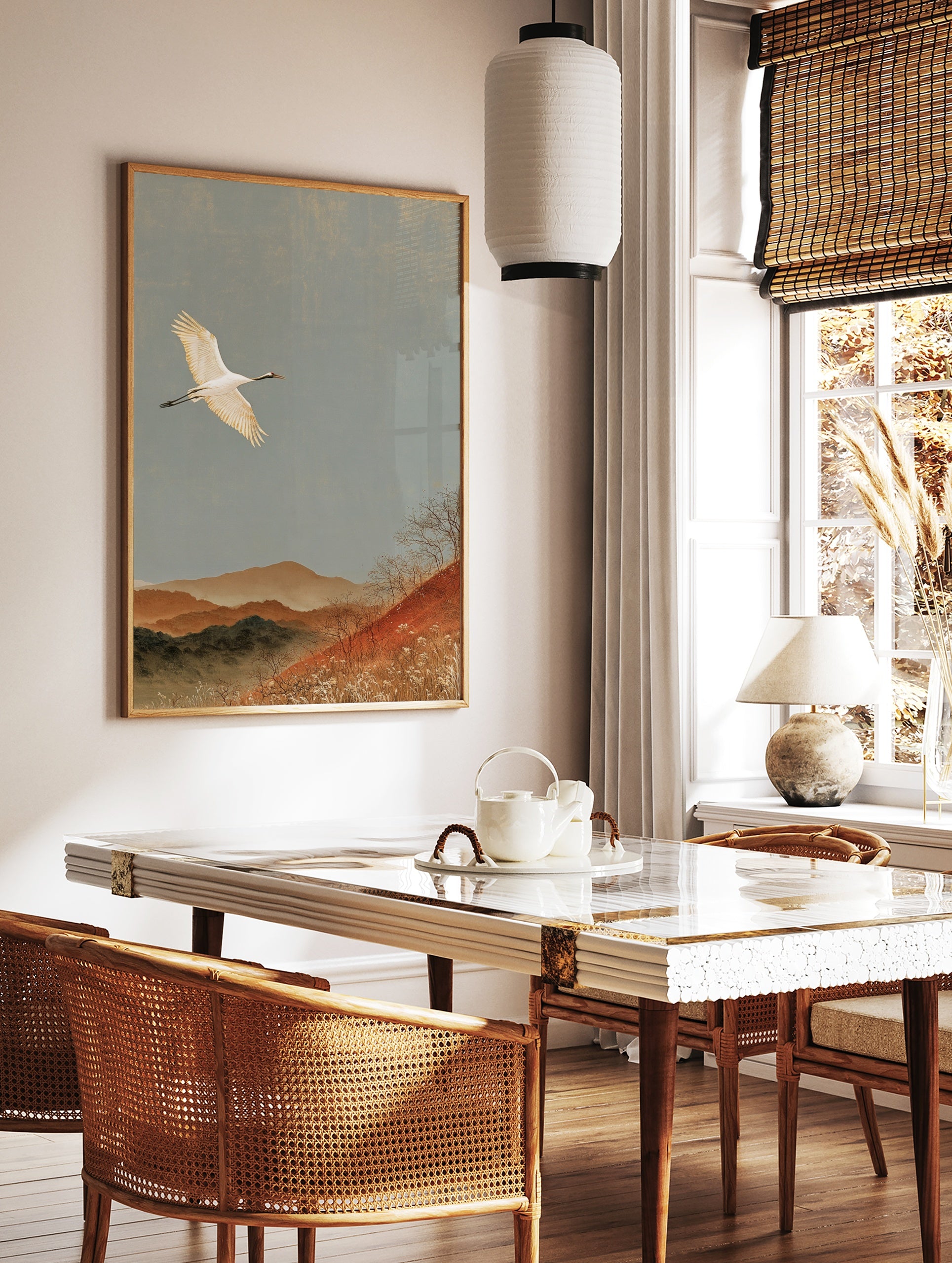Red-crowned crane flying over autumn mountains in a Japanese style art print on matte paper, in a styled room mockup