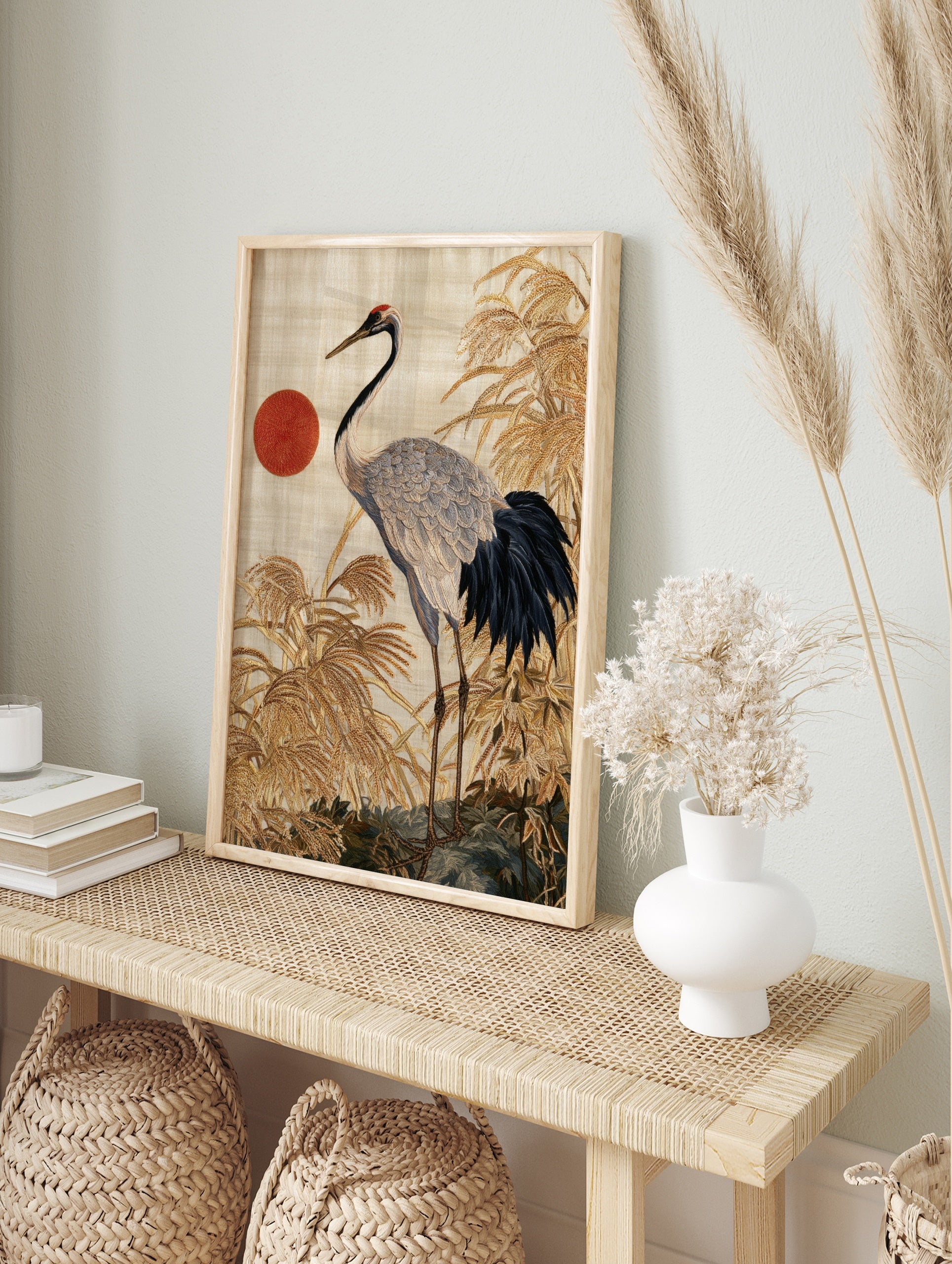 Red-crowned crane bird illustration with textured reeds and a red sun, Japanese-style, in an alternate framed mockup