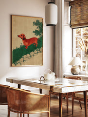 Red dachshund dog art print in vintage illustration style on green ground with beige background and sparse foliage. - Image 2