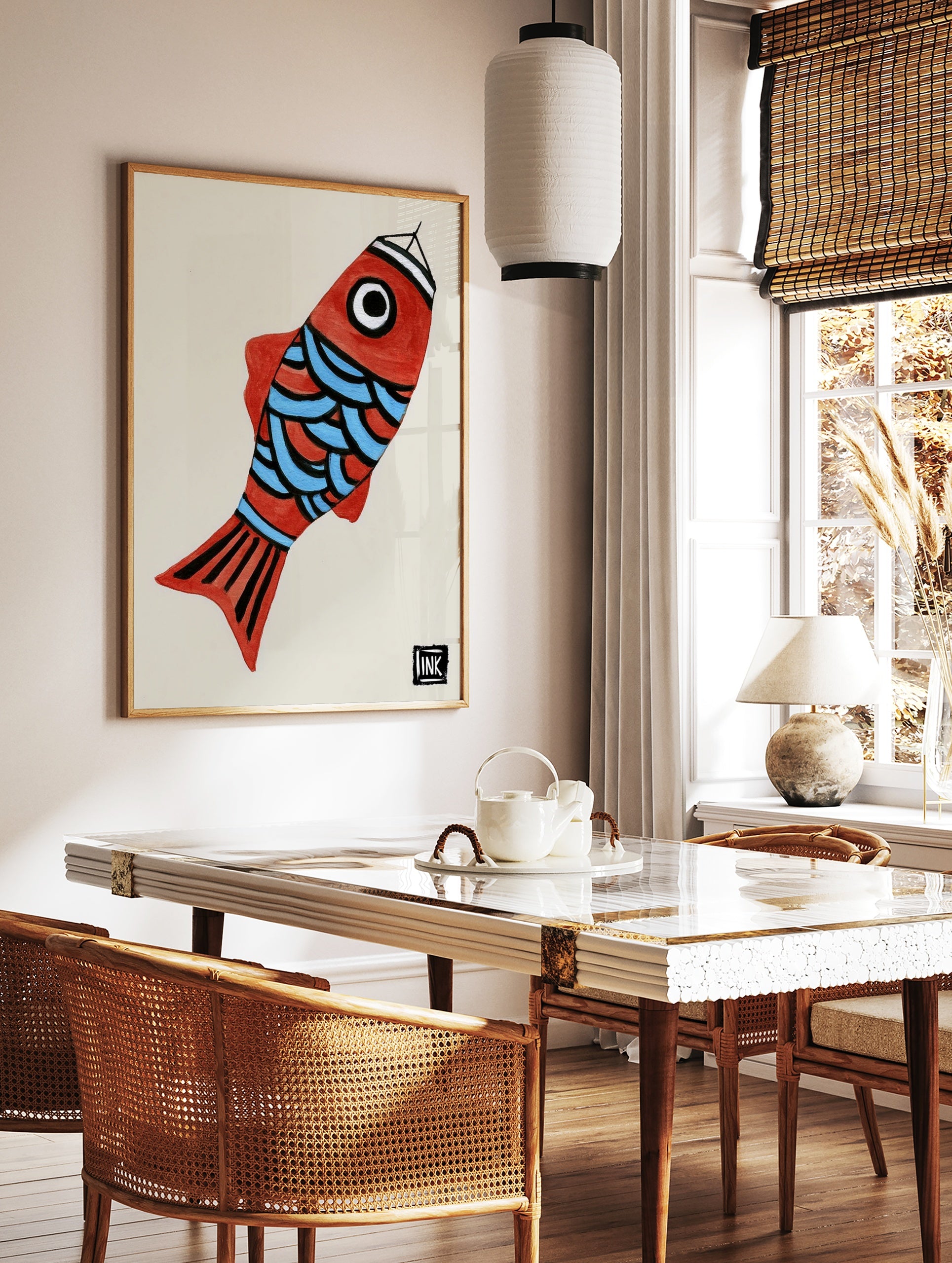 Illustrative red fish wall art with blue scales and graphic black details on a light background, in a styled room mockup