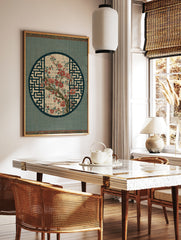 Red flower branch botanical illustration in a circular frame with geometric background, in a styled room mockup