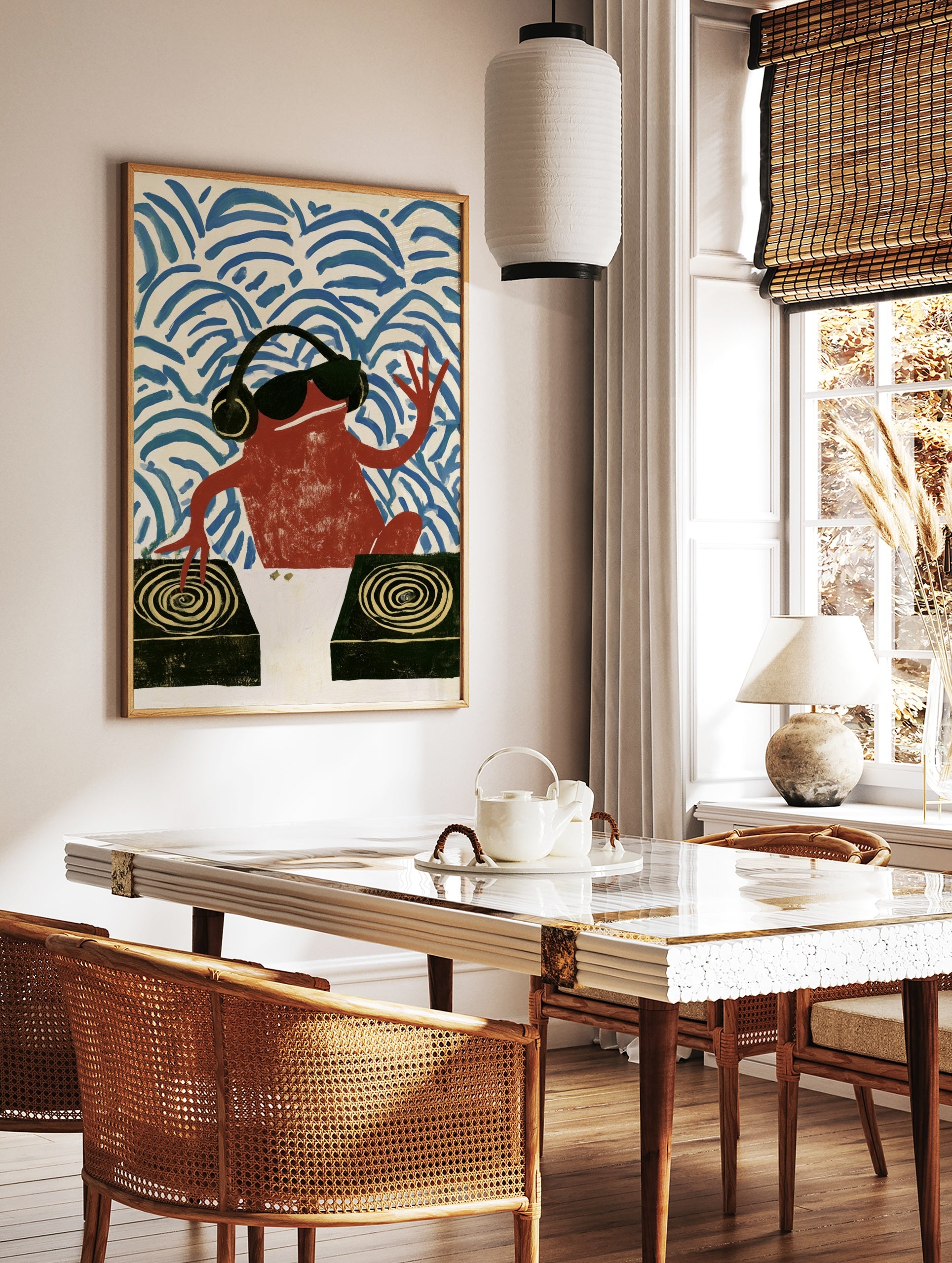 Illustration of a red frog DJ wearing headphones and sunglasses, mixing on turntables against a, in a styled room mockup