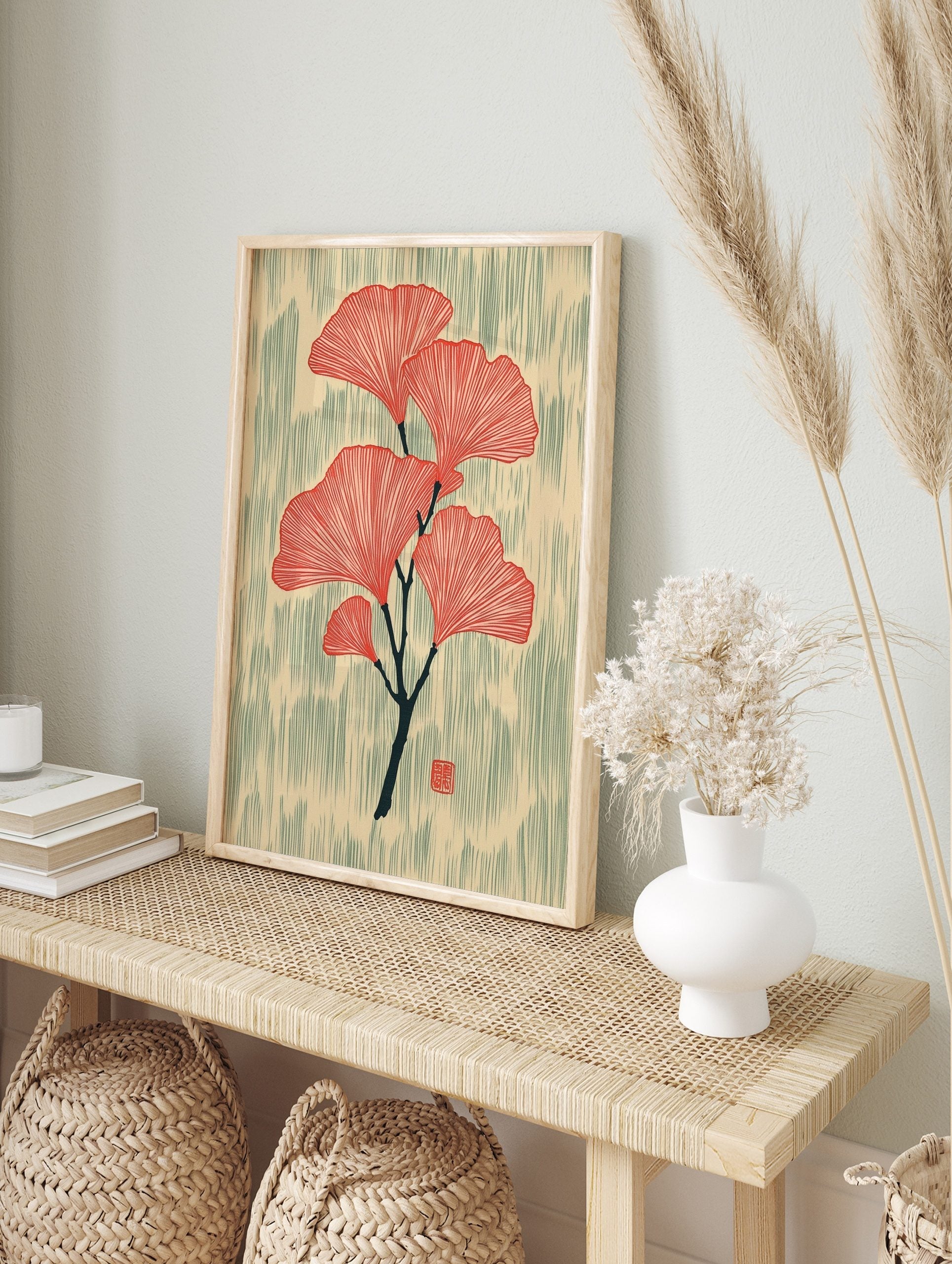 Red ginkgo leaves botanical illustration on a dark branch with textured beige and green-grey, in an alternate framed mockup