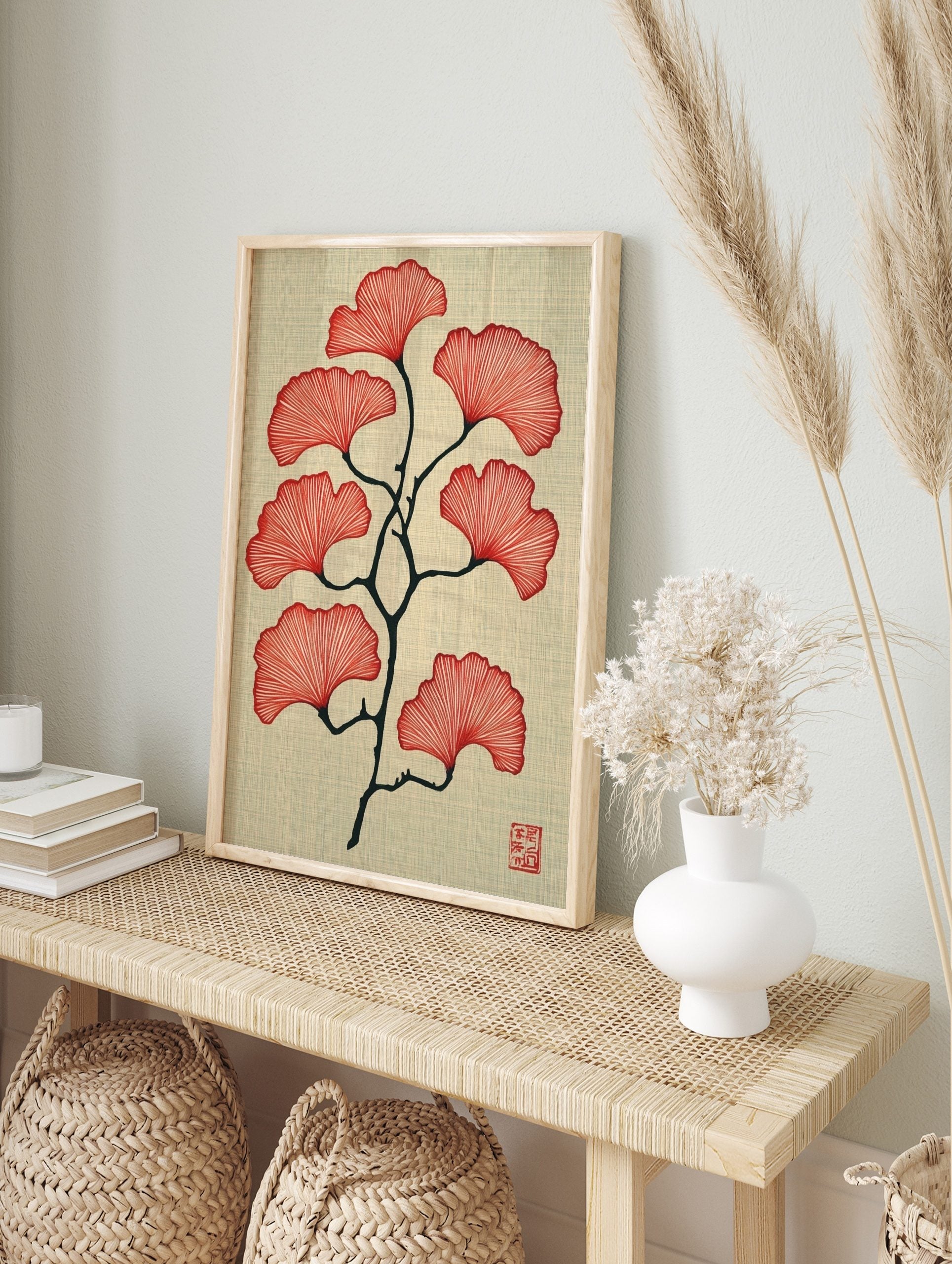 Red ginkgo leaves on a dark branch illustration on a textured beige background with a red seal, in an alternate framed mockup