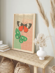 Red and green butterfly poster with two stylized insects on a textured striped background, one red, one green. - Image 4