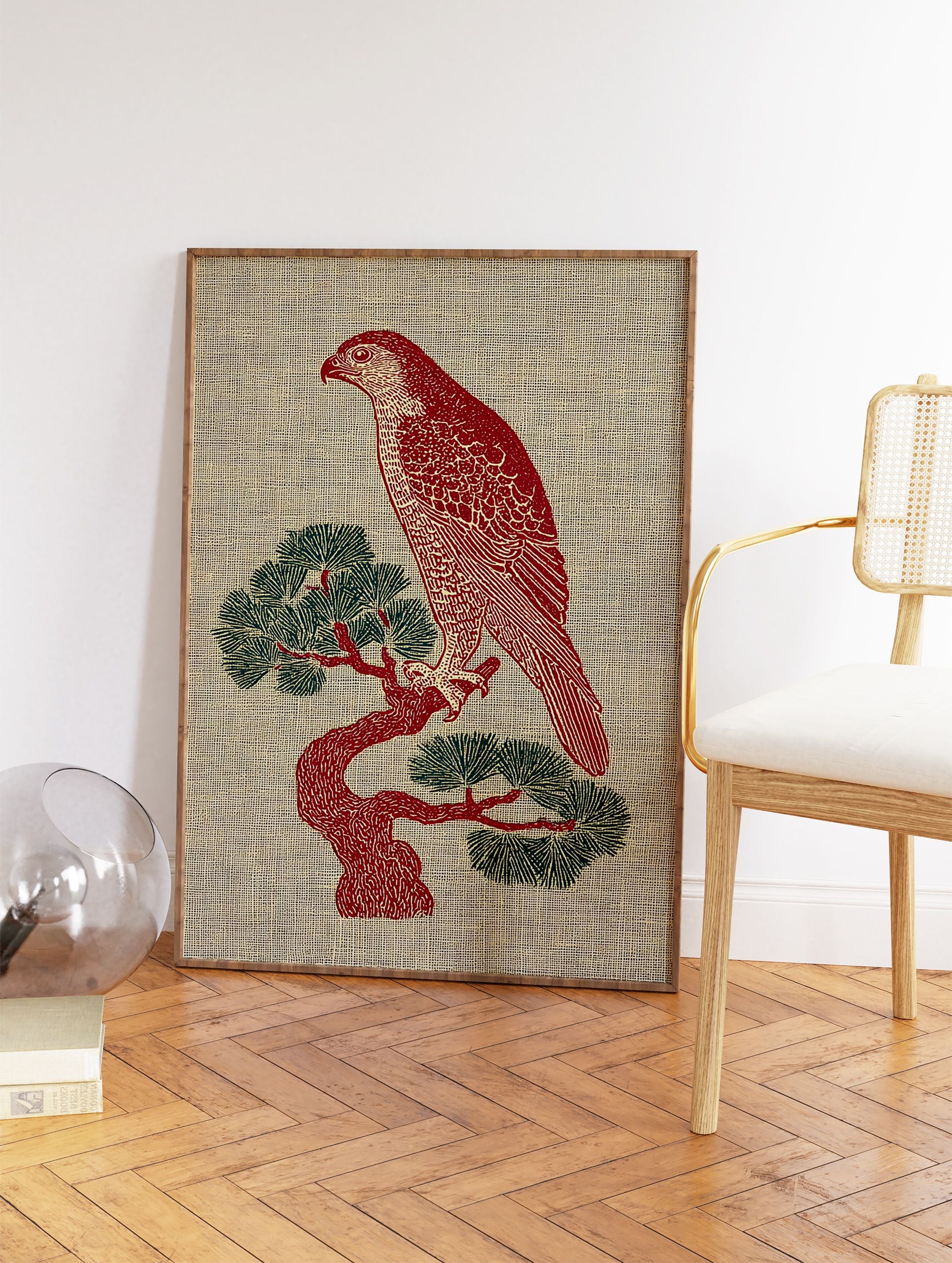 Red hawk illustration perched on a green pine tree, against a textured beige background. Illustrative bird wall art. - Image 2