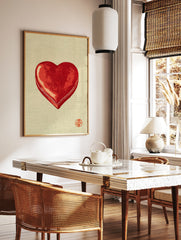 Minimalist red heart illustration with traditional red seal on a textured beige background, in a styled room mockup