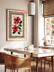 Red hibiscus wall art print with two vibrant flowers, green leaves, and decorative folk art borders on a cream background. - Image 3