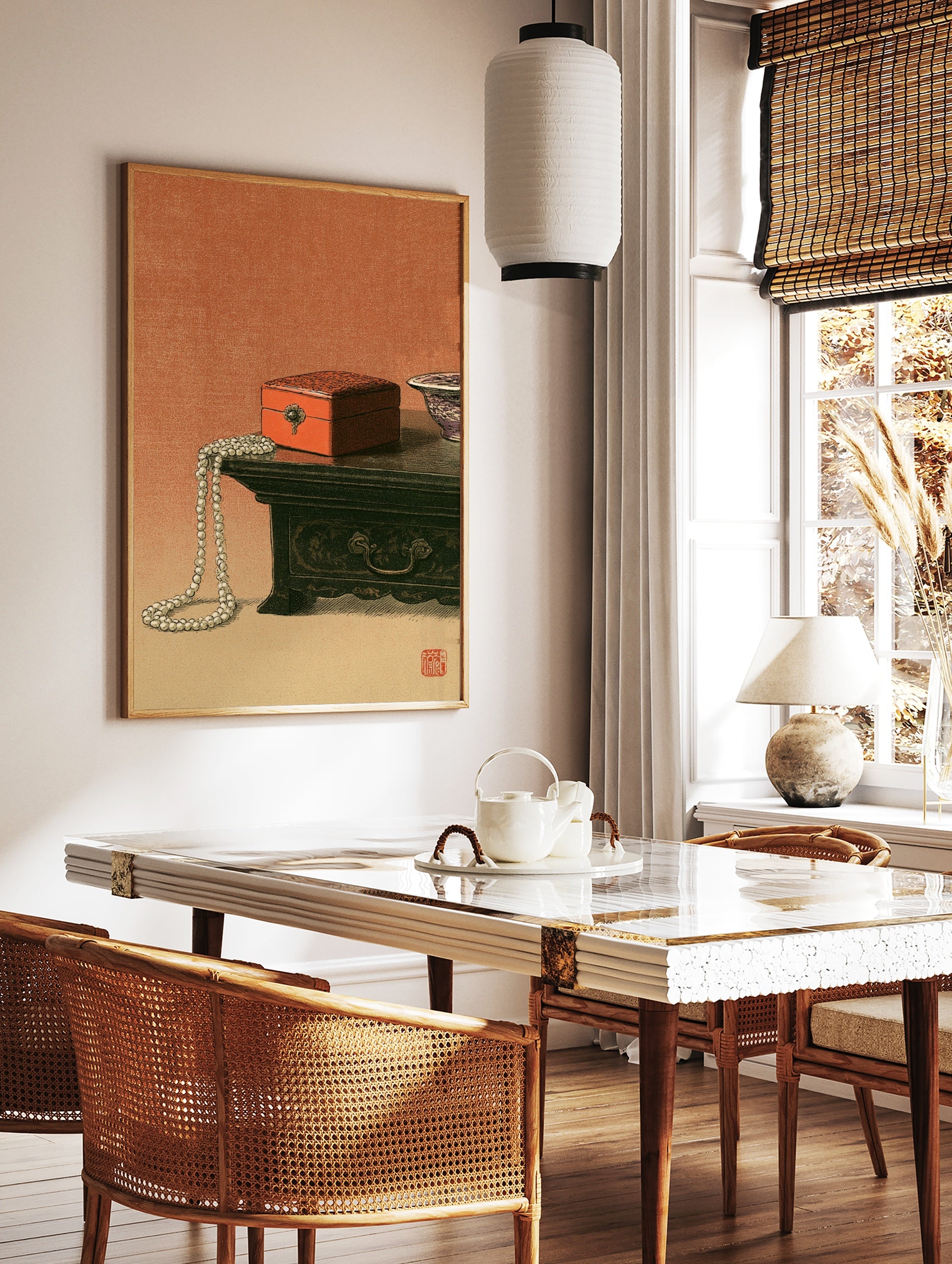 Still life art print of a red lacquer box and pearl necklace on a wooden table with a red seal stamp, in a styled room mockup