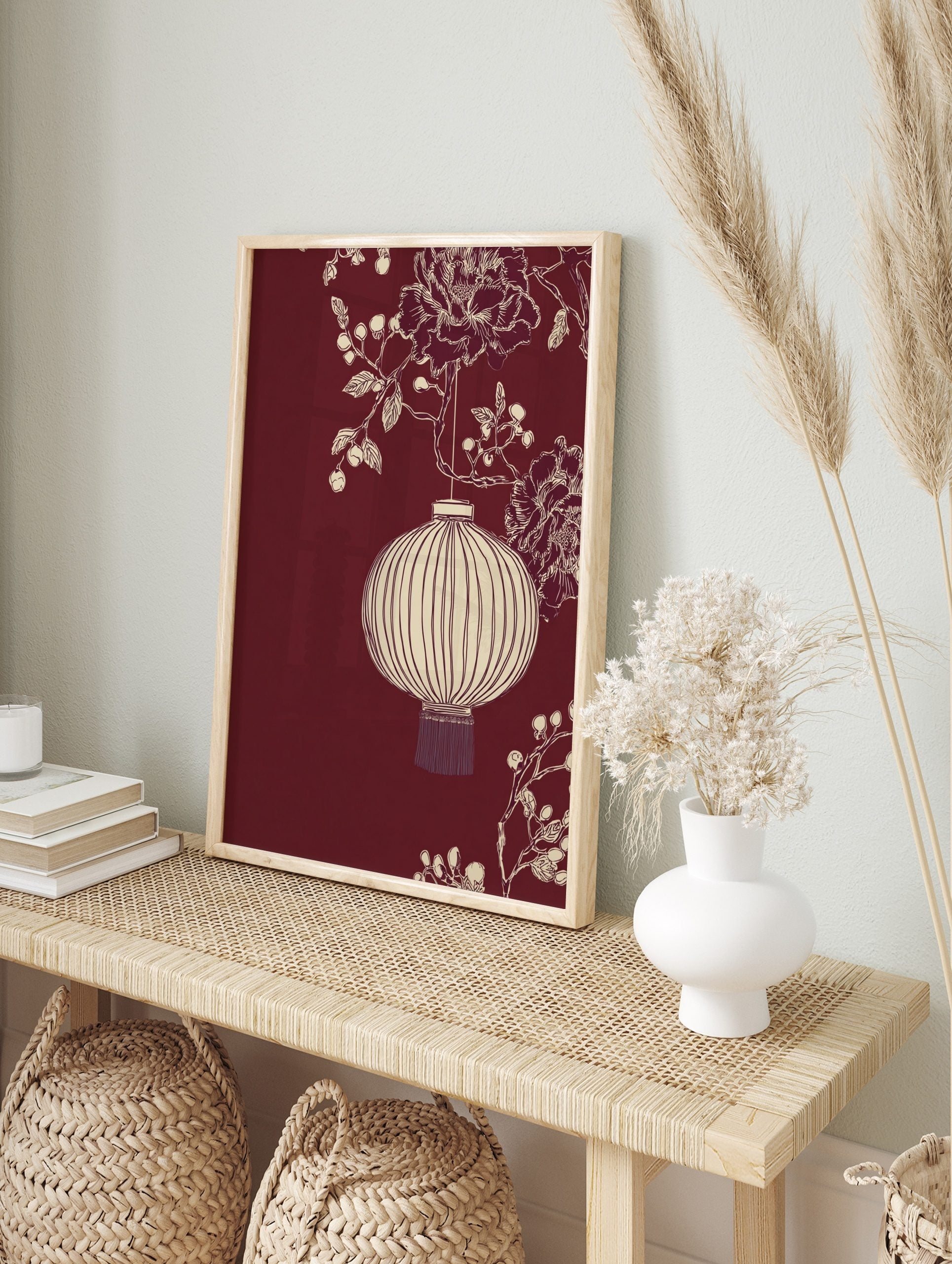 Illustrative off-white Chinese lantern with peonies and berries on a deep red background, in an alternate framed mockup
