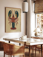 Illustrative red lobster wall art print with dark teal claws and orange spots on a light beige, in a styled room mockup
