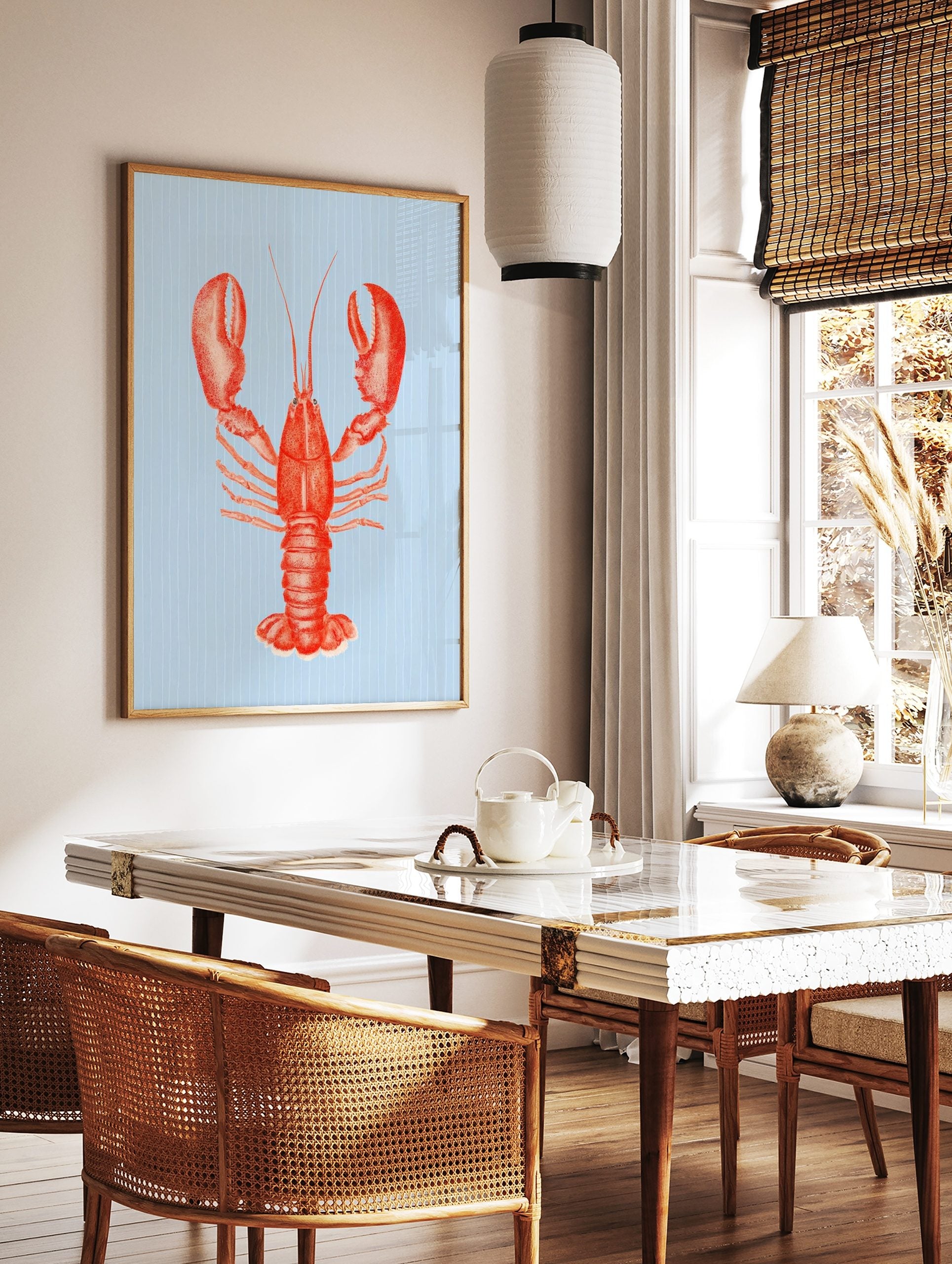 Red lobster illustration art print with large claws on a light blue striped background in portrait, in a styled room mockup