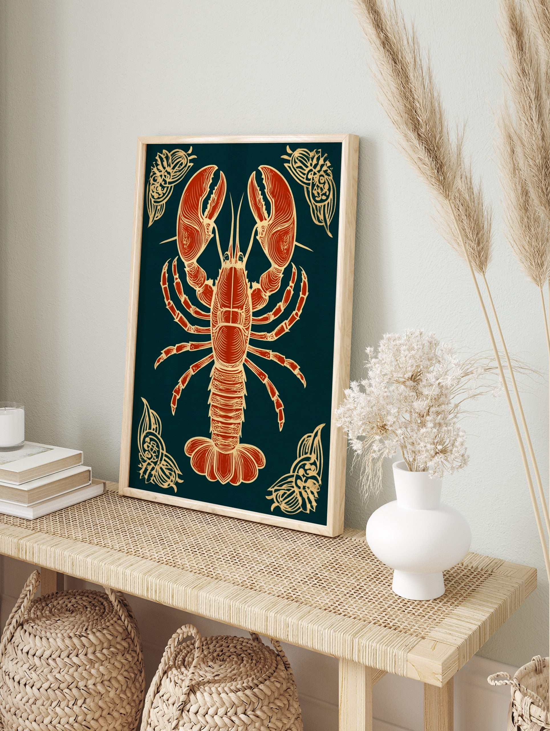 Red lobster illustration with beige-gold outlines on a dark navy background, with ornate, in an alternate framed mockup