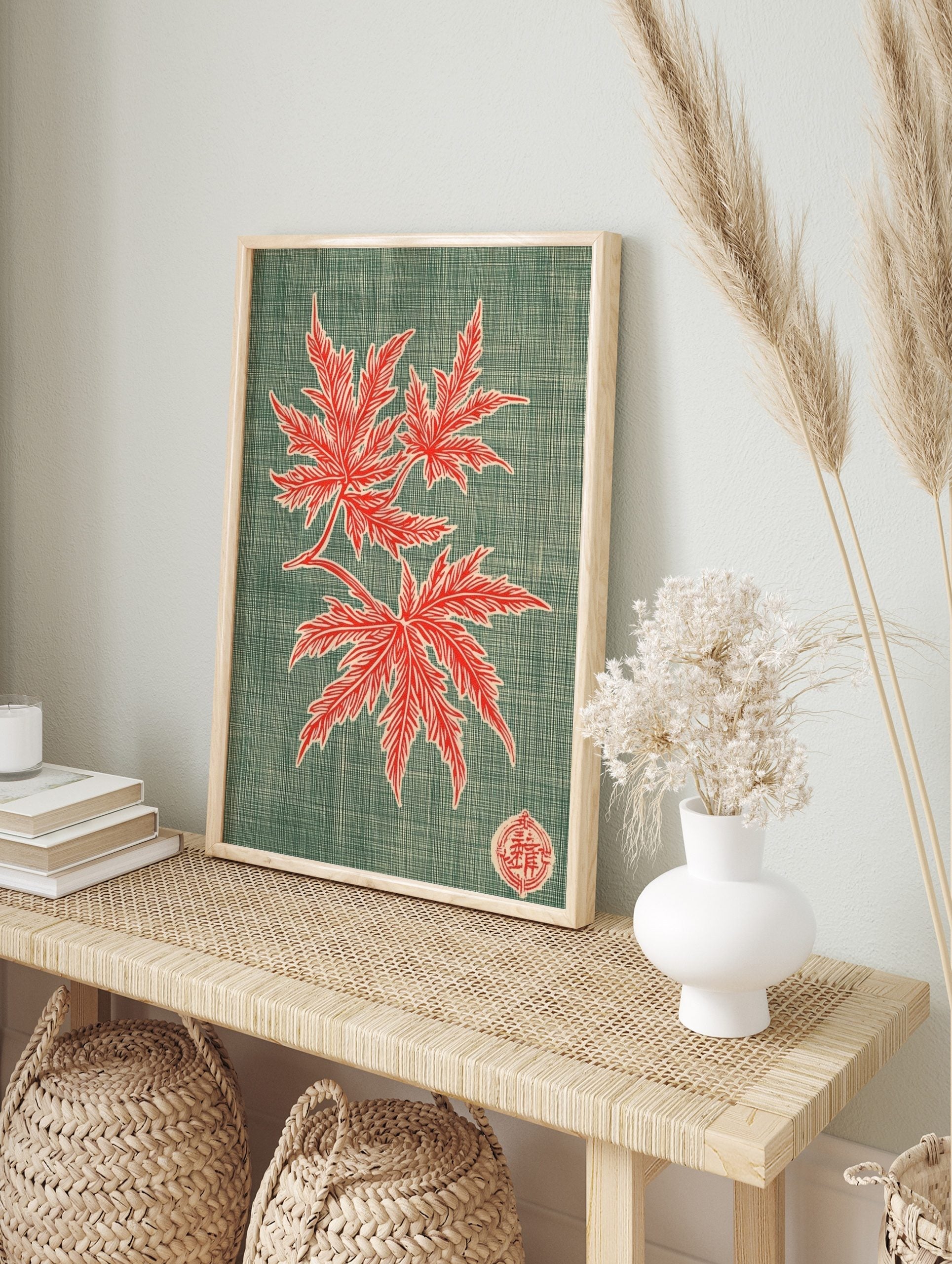 Red maple leaves botanical illustration with branch and Japanese seal on a textured teal, in an alternate framed mockup