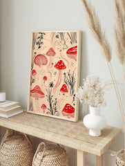 Red mushroom botanical illustration print with dark plant silhouettes on a light beige, in an alternate framed mockup