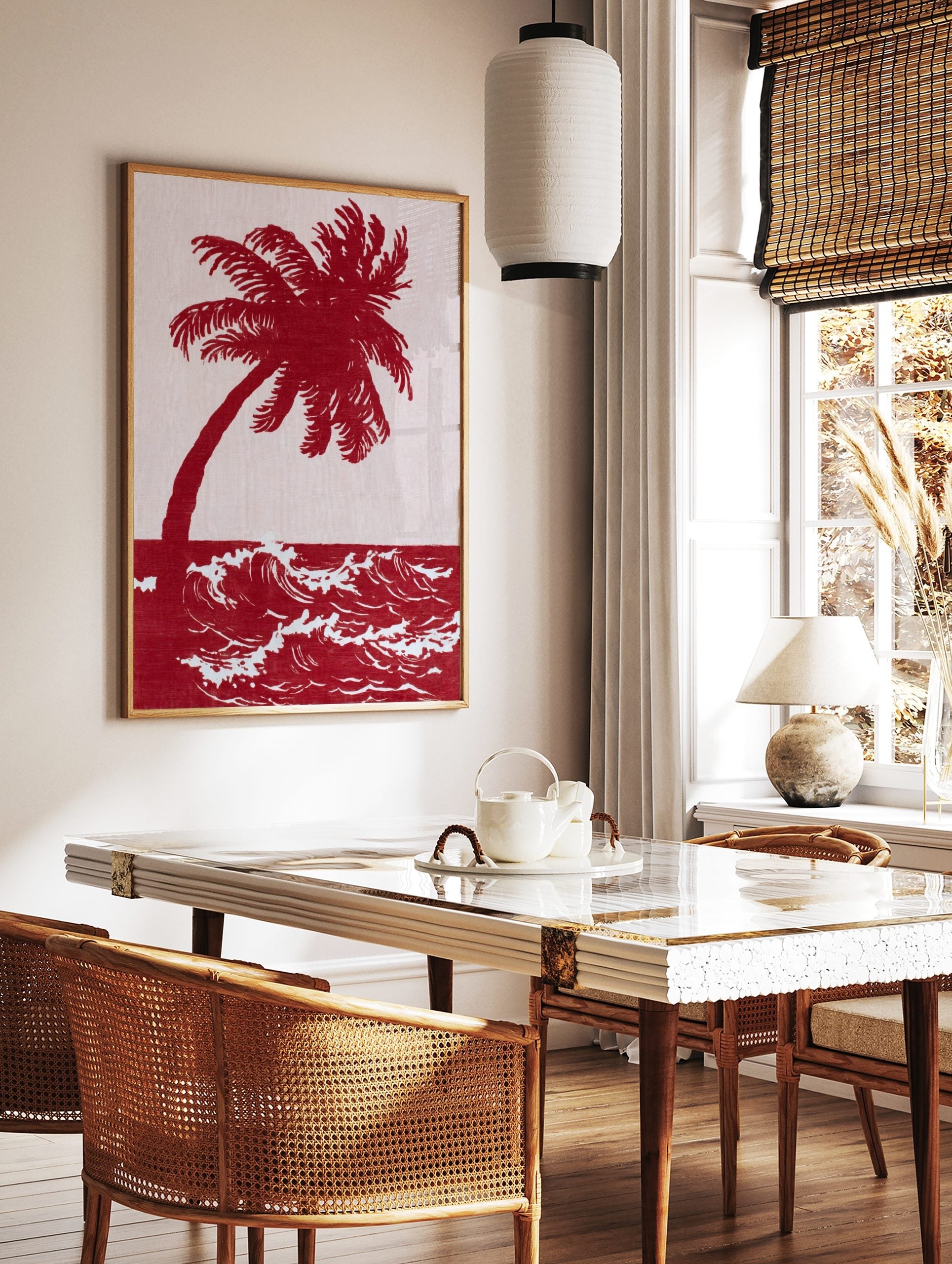 Red palm tree and ocean waves art print in an illustrative, high-contrast two-tone style, in a styled room mockup