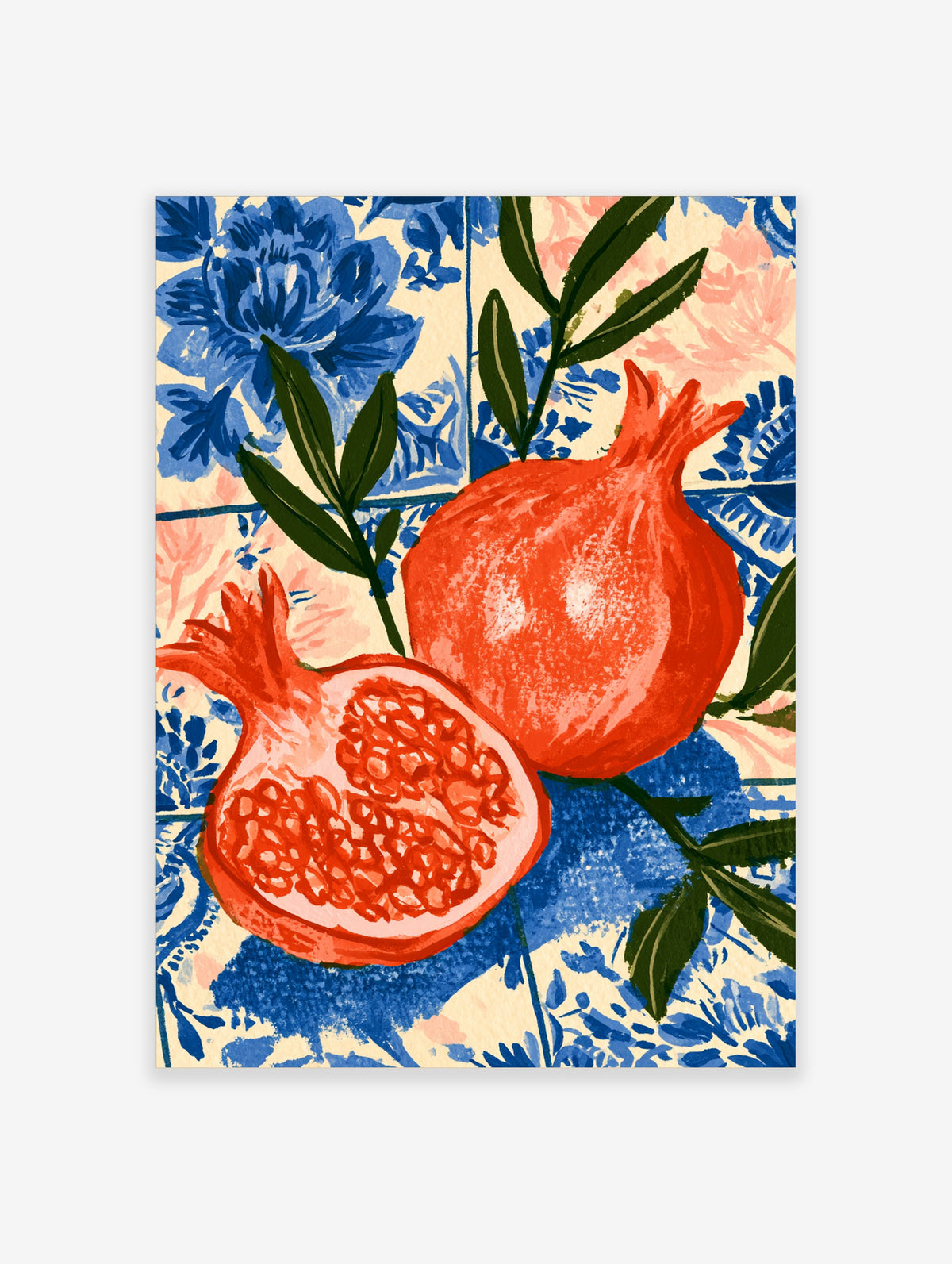 Red pomegranate wall art print with whole and cut fruit on blue floral tile background