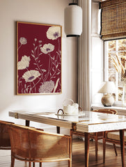 Cream line art poppy flowers and foliage on a deep maroon background in a botanical illustration, in a styled room mockup