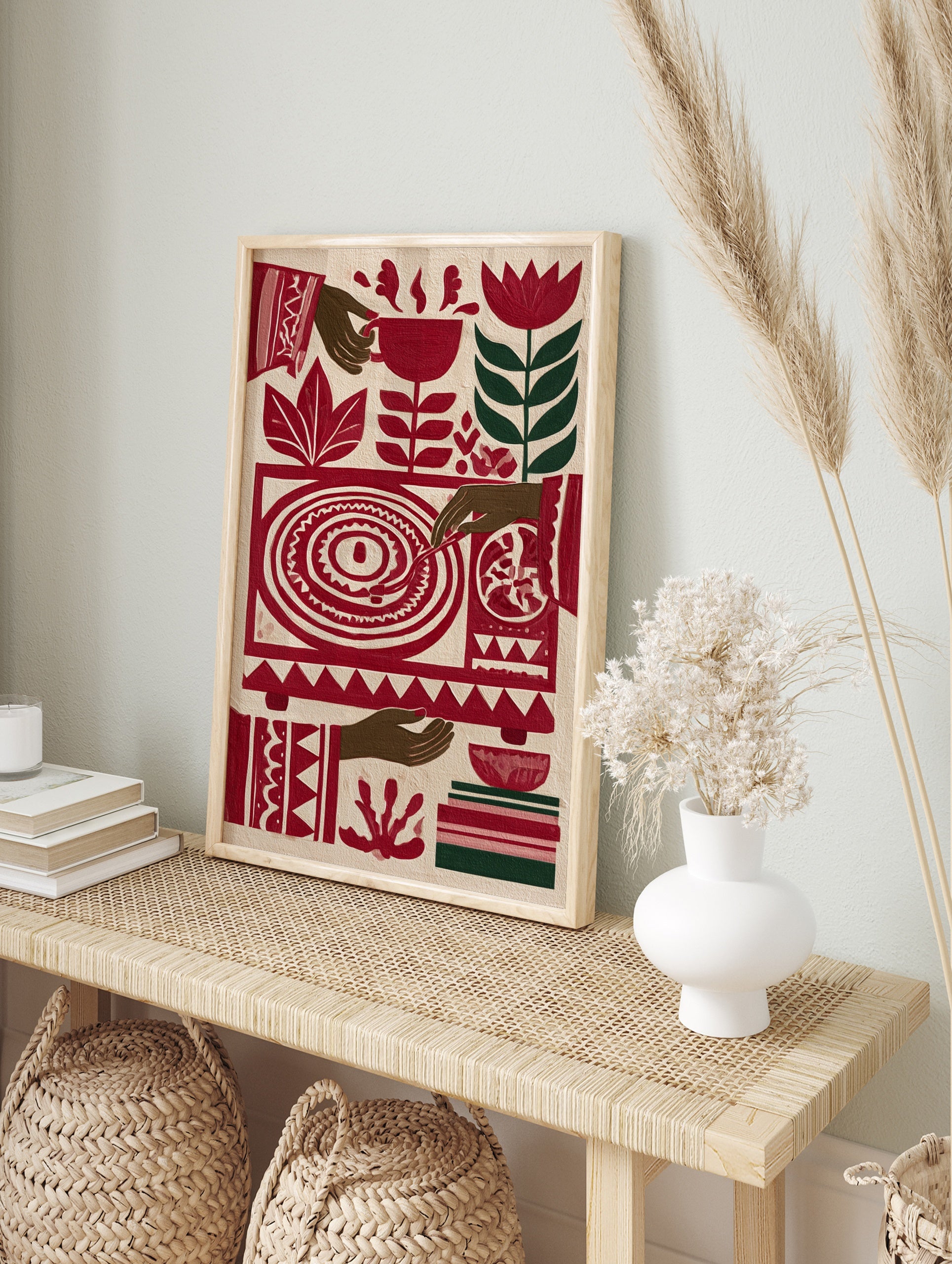 Stylised red record player wall art with botanical flowers and hands in a vibrant folk art, in an alternate framed mockup