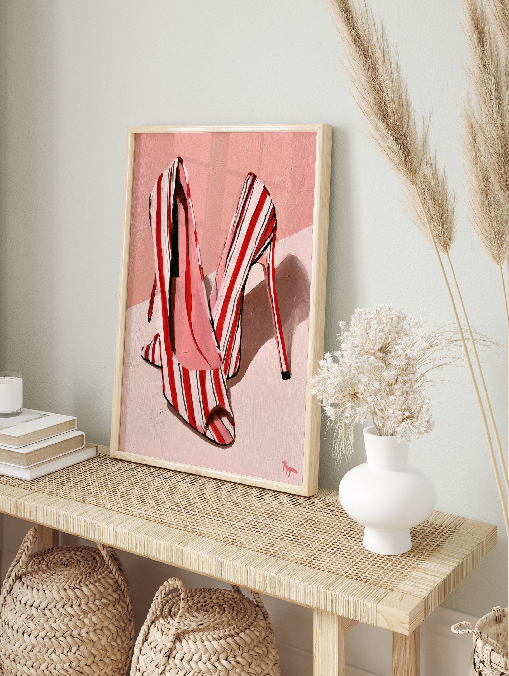 Fashion illustration of red and white striped high heel shoes on a soft pink background, in an alternate framed mockup