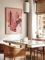 Fashion illustration of red and white striped high heel shoes on a soft pink background, in a styled room mockup